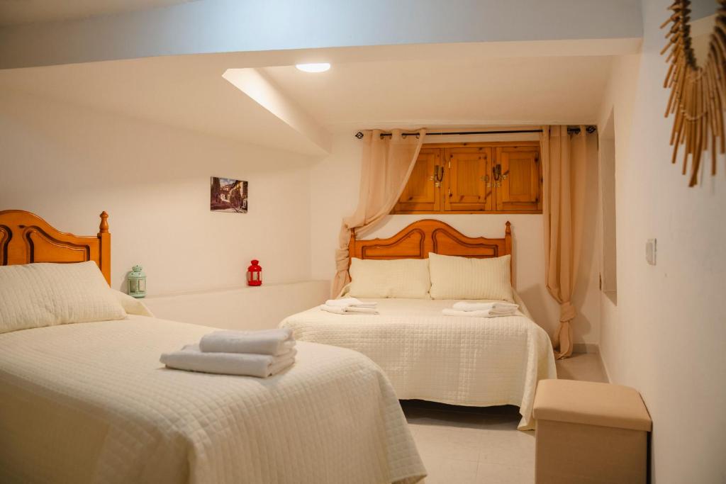 En eller flere senger på et rom på NAPAIMBE SIERRA