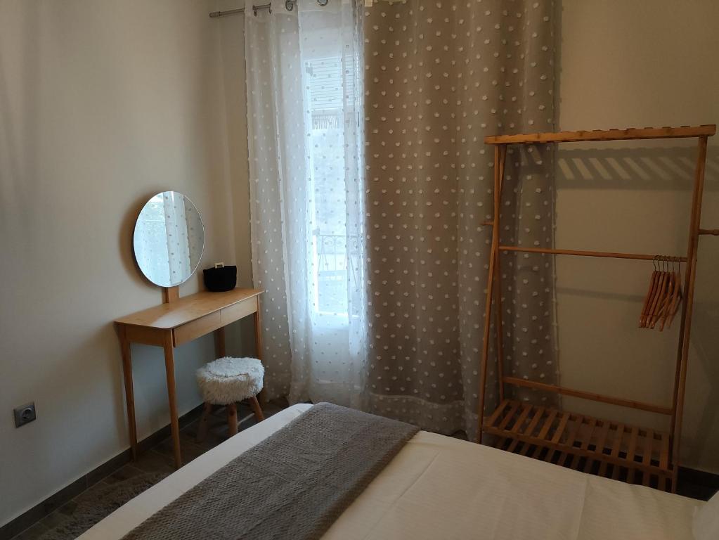 Posteľ alebo postele v izbe v ubytovaní Corfu Town SUNSHINE Apartment