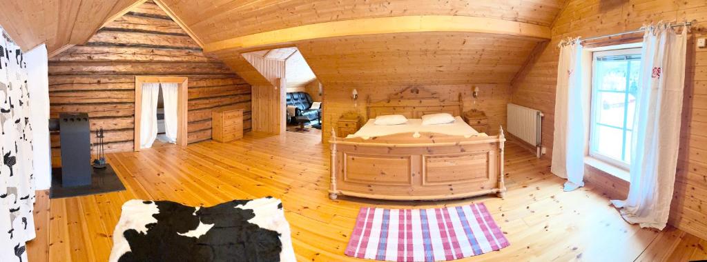 Кровать или кровати в номере Lillstugan Sälen by