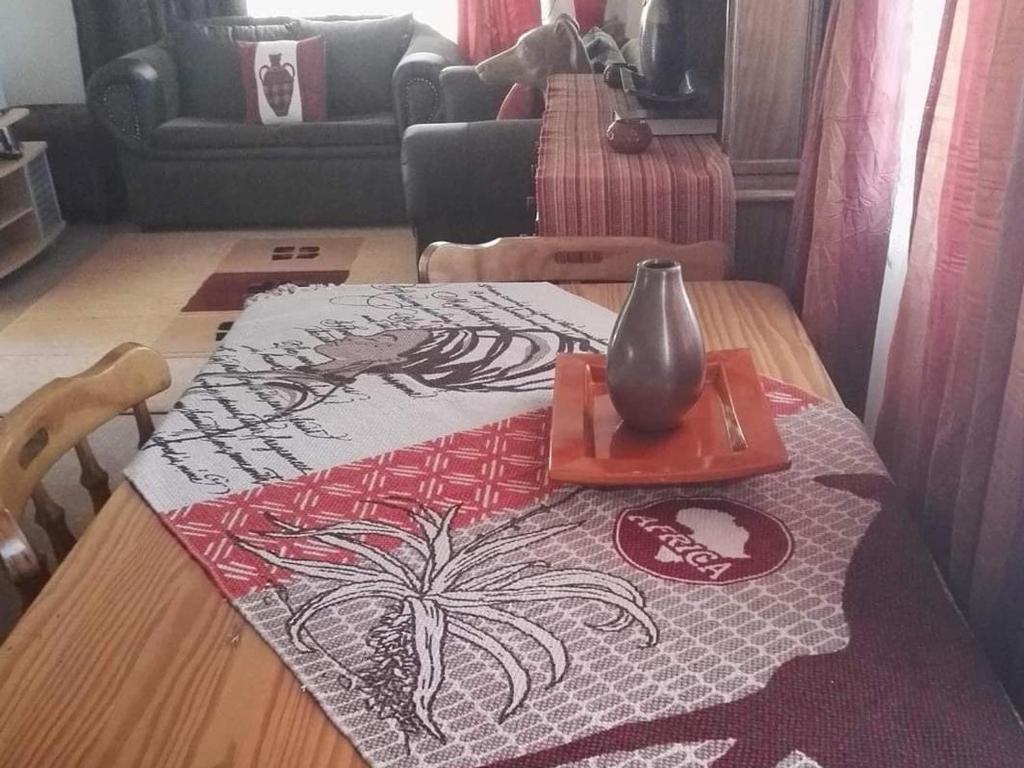 Posezení v ubytování Kettle Guest Lodge Rustenburg