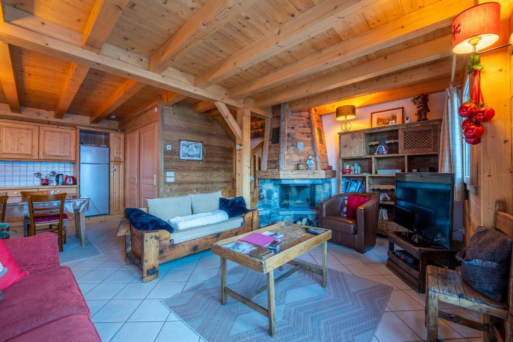 Część wypoczynkowa w obiekcie Cosymontagne - Le Chalet - 3Ch - 8 pers- Terrasse Sud, magnifique vue