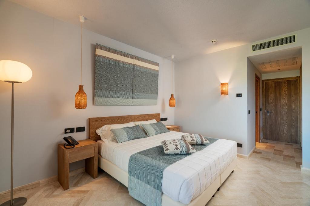 Postel nebo postele na pokoji v ubytování Hotel Sestante