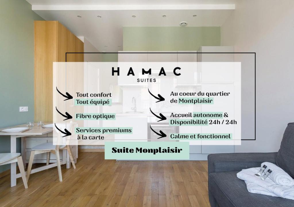 een woonkamer met een muur met een bord waarop staat hamagic bij Hamac Suites - Monplaisir fully equipped studio-2p in Lyon