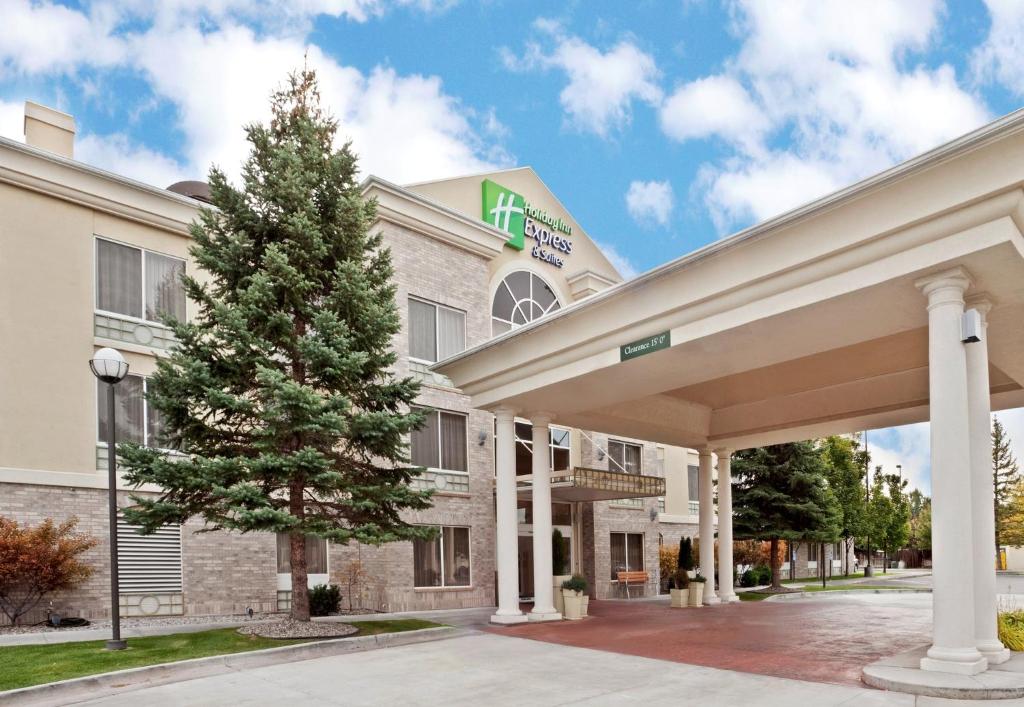 a rendering of a hotel with a christmas tree outside at Holiday Inn Express Hotel & Suites Idaho Falls, an IHG Hotel in Idaho Falls