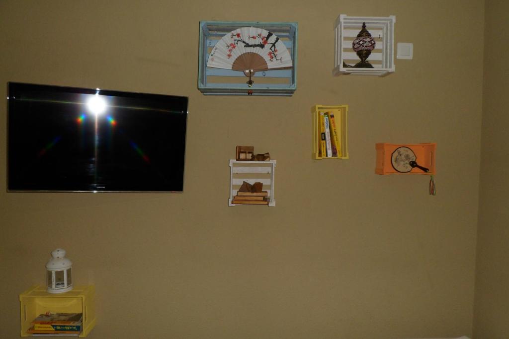 TV a/nebo společenská místnost v ubytování Granada Old Town Hostel