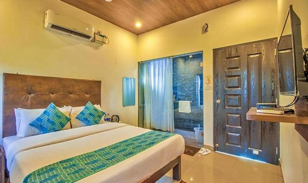 Postel nebo postele na pokoji v ubytování Hotel Balaji Inn Baga