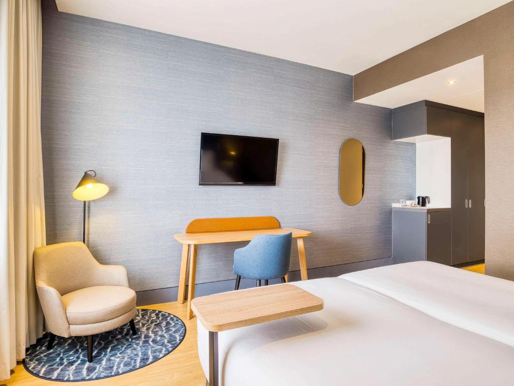 Postel nebo postele na pokoji v ubytování Mercure Hotel Amersfoort Centre