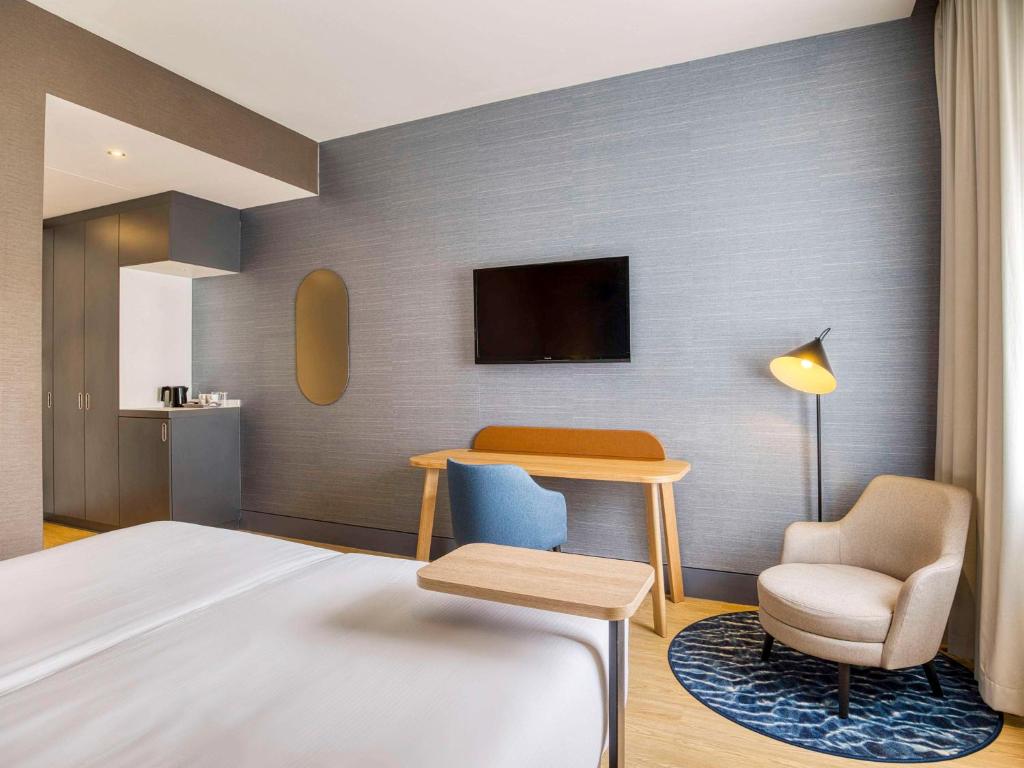 Postel nebo postele na pokoji v ubytování Mercure Hotel Amersfoort Centre