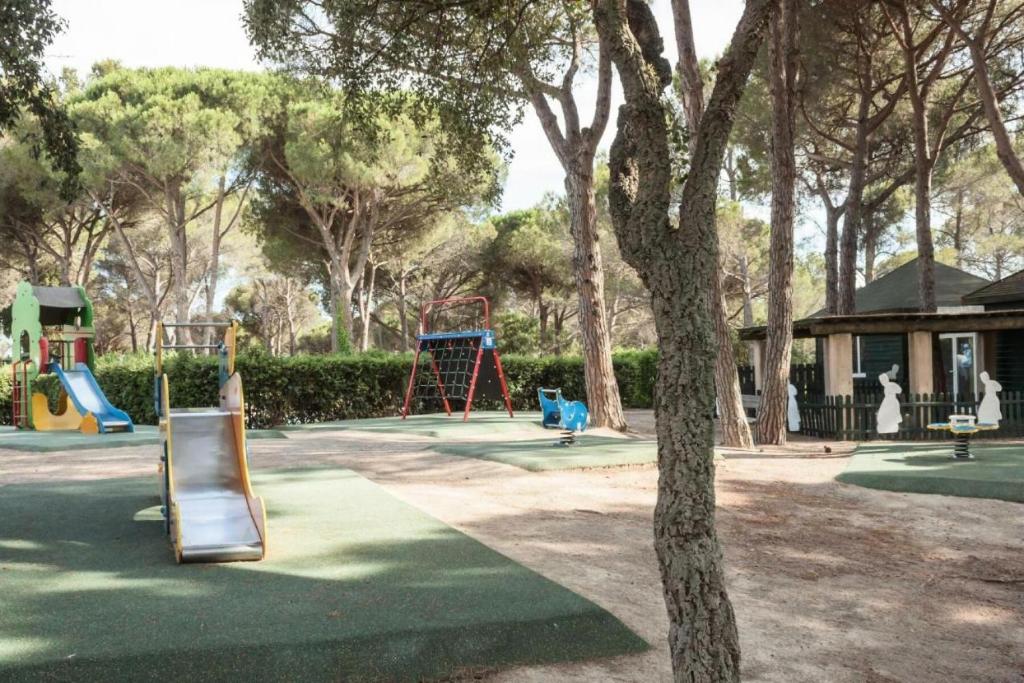 a park with a playground with a swing at Résidence Saint-Raphaël Valescure - maeva Home - Studio 2 personnes - Séle 41 in Valescure