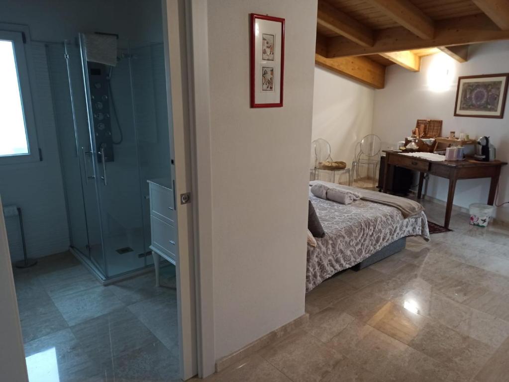 Postel nebo postele na pokoji v ubytování Casa Ghirthalos