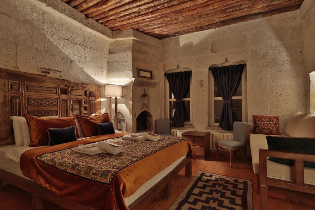 Postel nebo postele na pokoji v ubytování Rox Cappadocia