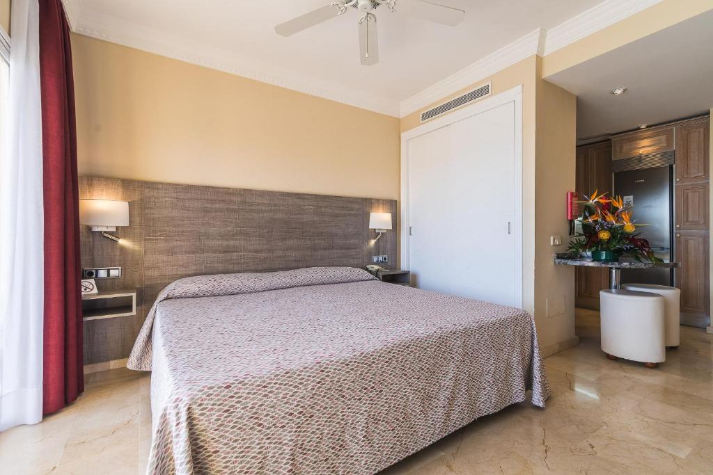 Letto o letti in una camera di Palm Oasis Maspalomas