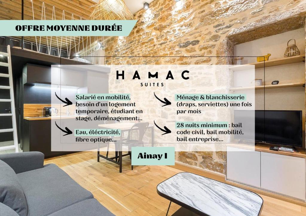 una stanza con un muro con un cartello che dice hamsa di Hamac Suites - studio Ainay 1 - hyper centre Lyon a Lione