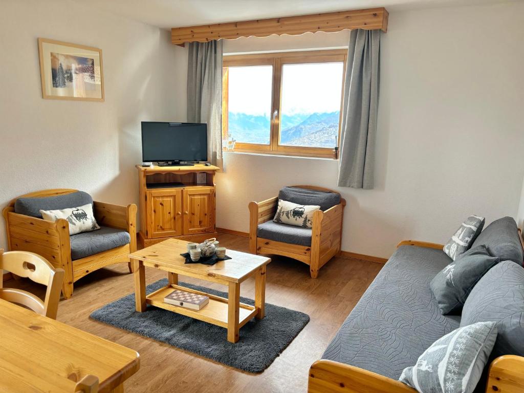 Posezení v ubytování Appartamento Pracondu, ski-in ski-out, con vista sulle alpi