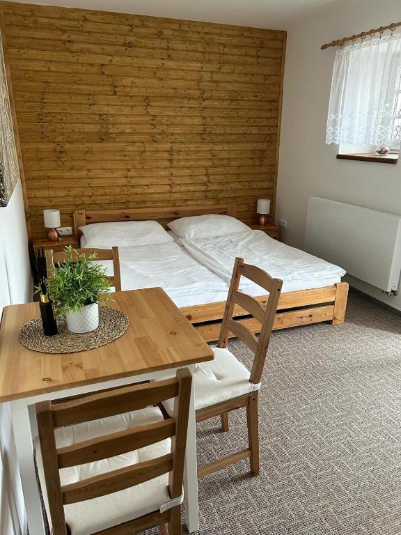 Postel nebo postele na pokoji v ubytování Apartmány u Pálavy