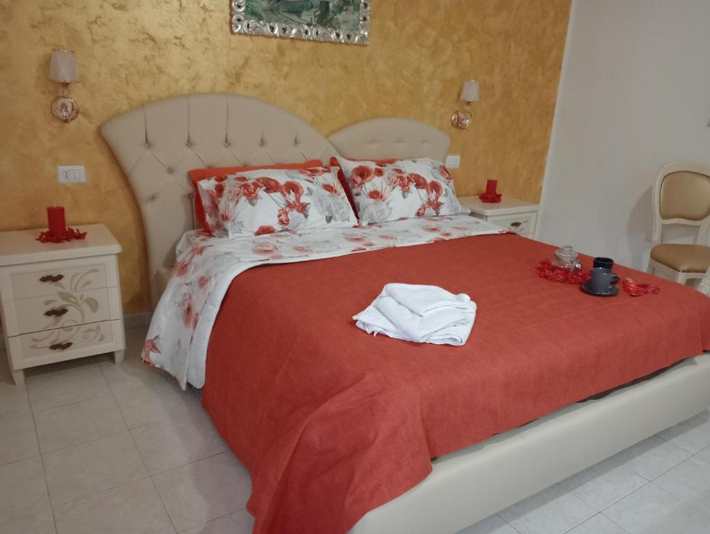 Postel nebo postele na pokoji v ubytování Piccola Residenza Cassandra
