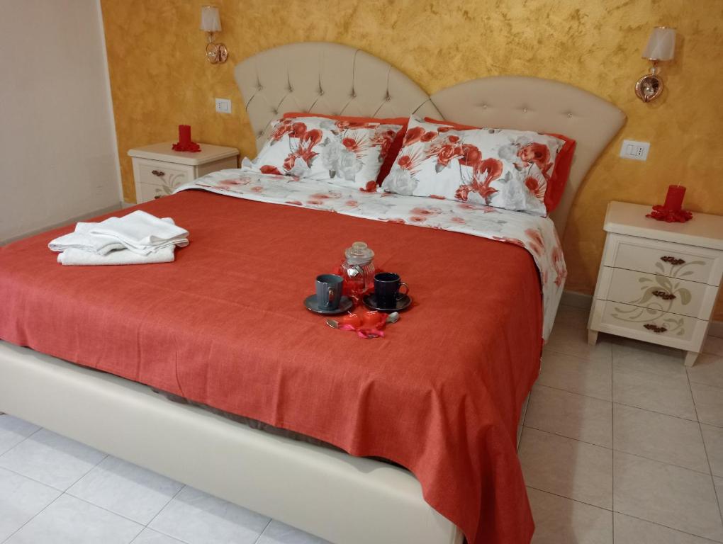 Postel nebo postele na pokoji v ubytování Piccola Residenza Cassandra