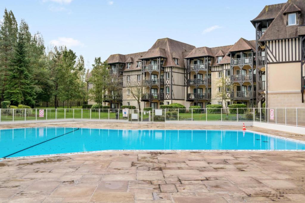 Bazén v ubytovaní La Résidence du Golf - maeva Home - Appartement 2 pièces 4 personnes - Confort MAE-5444 alebo v jeho blízkosti