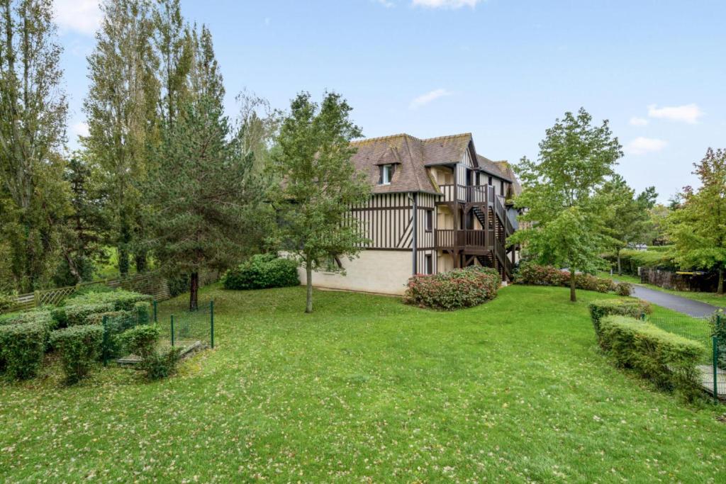 Vonkajšia záhrada v ubytovaní La Résidence du Golf - maeva Home - Appartement 2 pièces 4 personnes - Confort MAE-5444