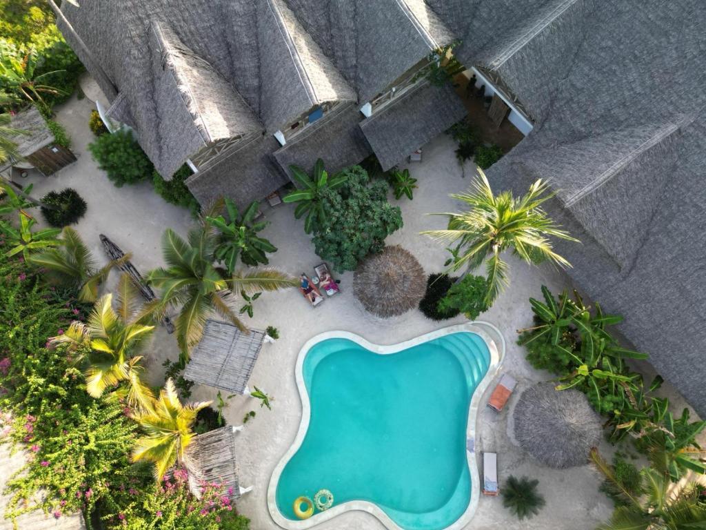an overhead view of a resort with a swimming pool at Boutique Villa Unaweza in Matemwe