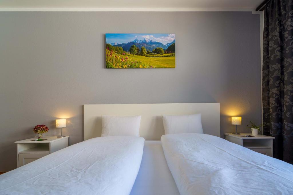 Postel nebo postele na pokoji v ubytování Hotel Toggenburg