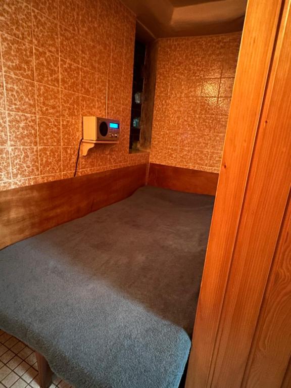 Postel nebo postele na pokoji v ubytování Hessestub mit Sauna