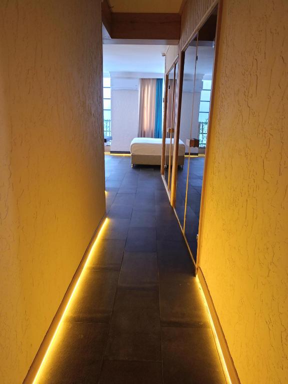 Postel nebo postele na pokoji v ubytování PRIVADO HOTELS