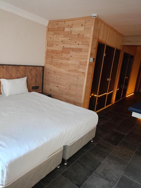 Postel nebo postele na pokoji v ubytování PRIVADO HOTELS