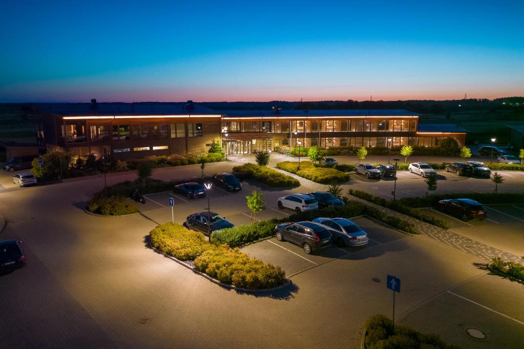 an overhead view of a building with a parking lot at Jurmala Golf Club&Hotel in Piņķi