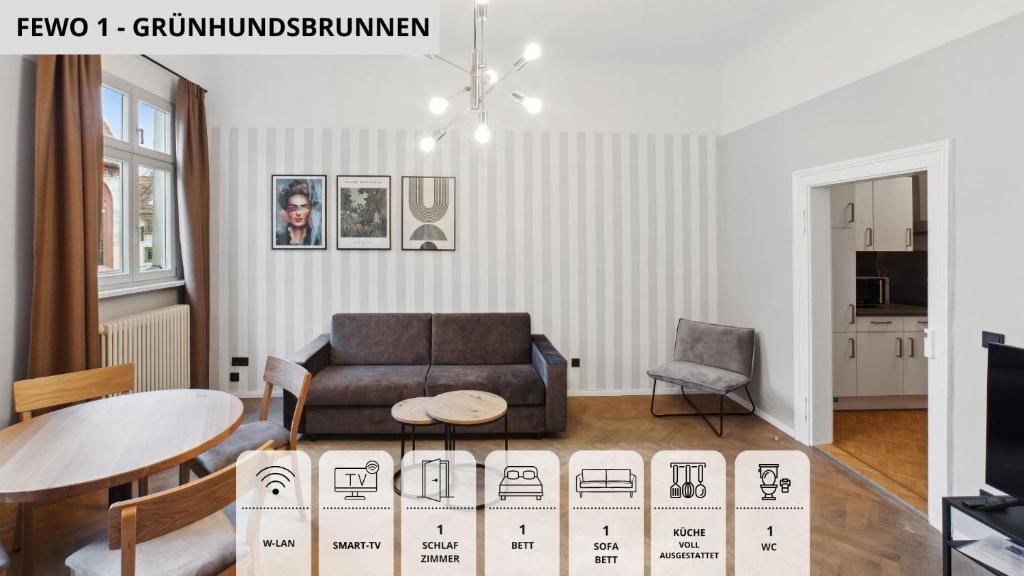 a living room with a couch and a table at NEU SandAPART32 - 3 tolle FeWos von 1-8 Pers mitten in der Altstadt in Bamberg