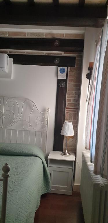 Postel nebo postele na pokoji v ubytování La Dolce Vita