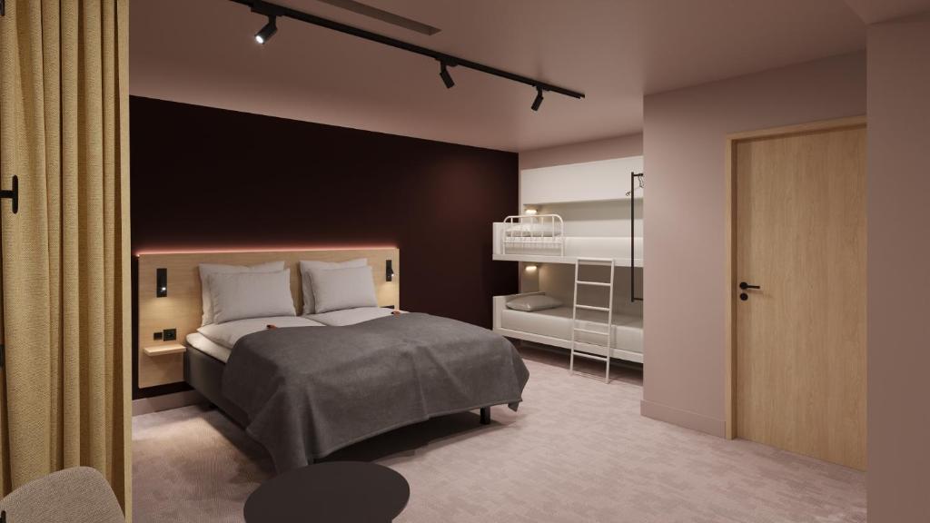 a bedroom with a large bed and a closet at Citybox Stockholm in Stockholm