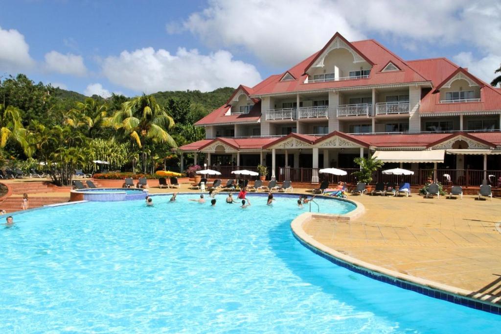 a large swimming pool in front of a hotel at Village Sainte Luce, Martinique - maeva Home - Studio 3 personnes - Prestige 704 in Sainte-Luce