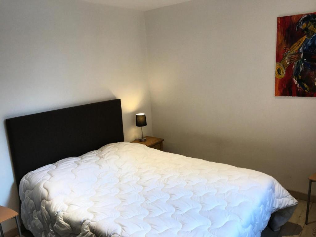 Posteľ alebo postele v izbe v ubytovaní Résidence Loup Blanc - Bel appartement moderne pour 4/6 personnes MAE-8454
