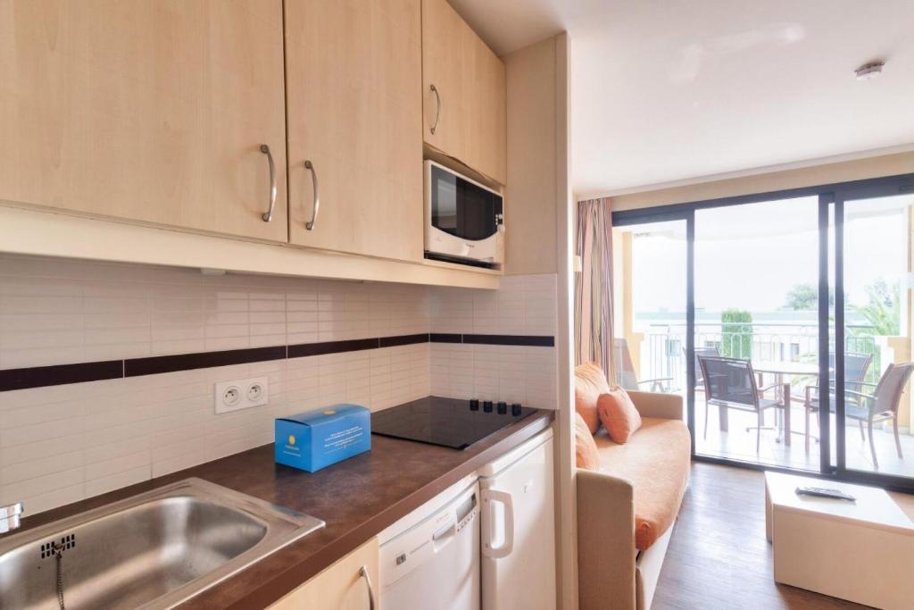 Kuchyňa alebo kuchynka v ubytovaní Résidence Cannes Villa Francia - maeva Home - Appartement 2 pièces 5 personnes - Budget MAE-0634