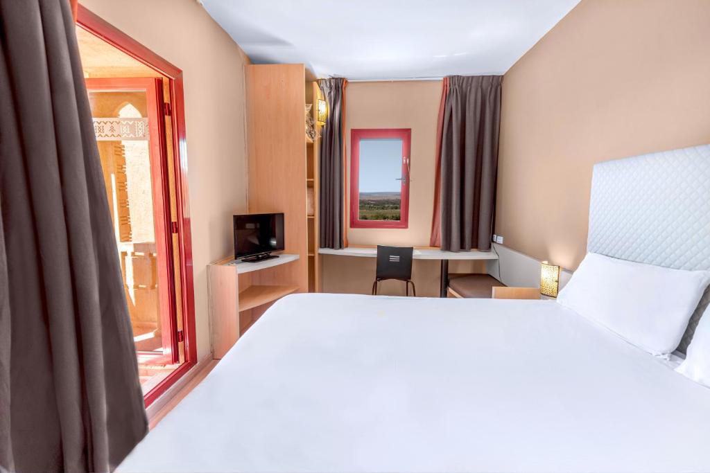 Postel nebo postele na pokoji v ubytování Ibis Ouarzazate Centre