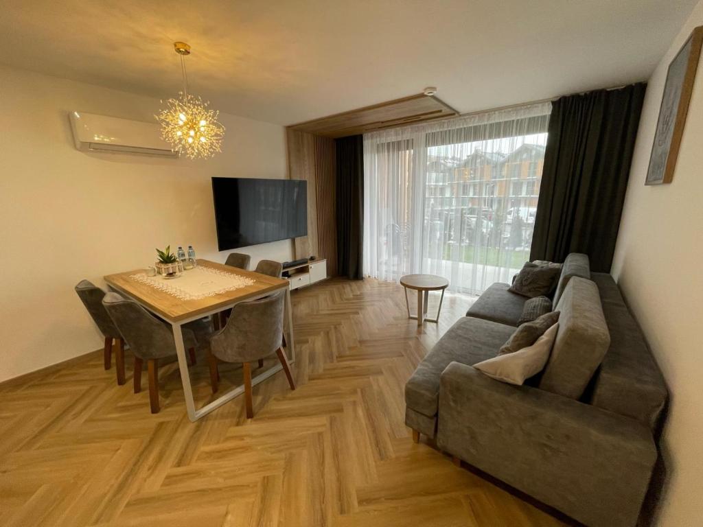 Posezení v ubytování Apartament K Laguna Beskidów