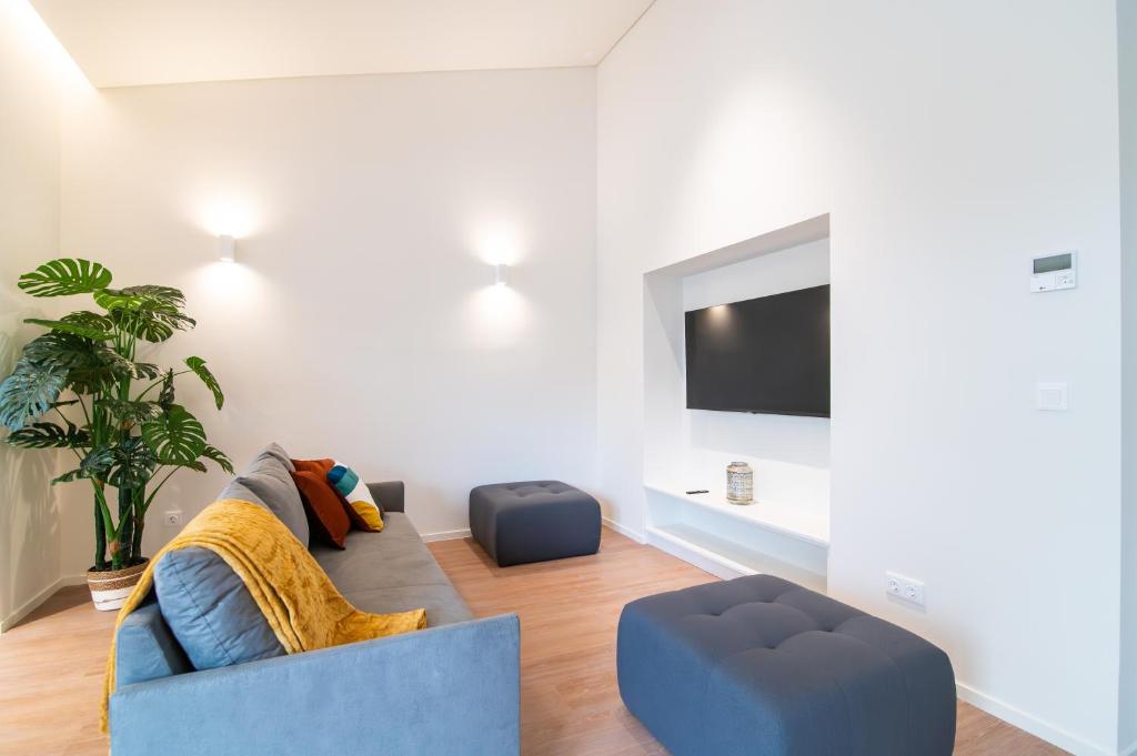 TV a/nebo společenská místnost v ubytování Azoriani City Hostel Ponta Delgada