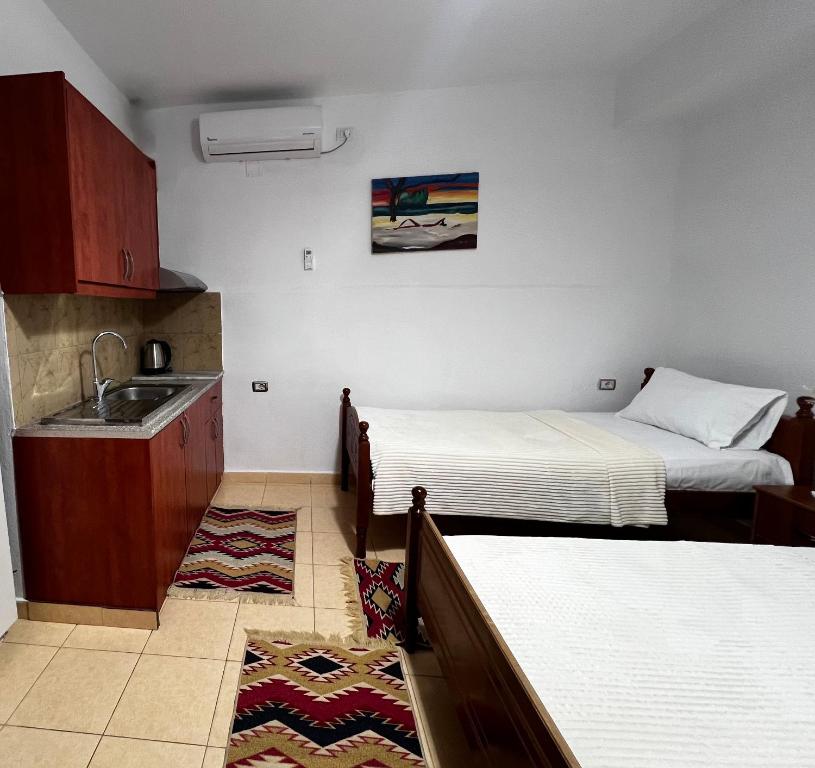 Postel nebo postele na pokoji v ubytování Tourists Guest House