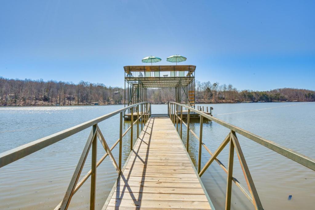 a dock on a body of water at Lake Hartwell Retreat with 2-Tier Dock and Boat Slip! in Seneca