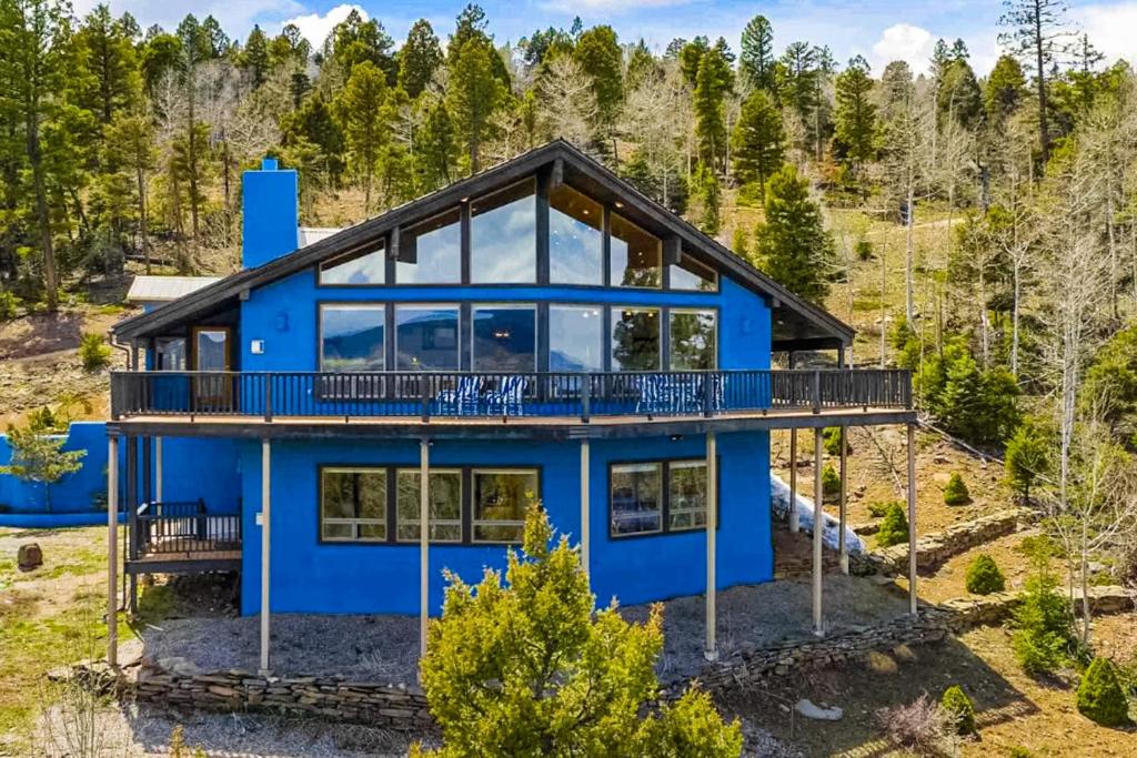 an aerial view of a blue house at Le Chalet Bleu in Angel Fire
