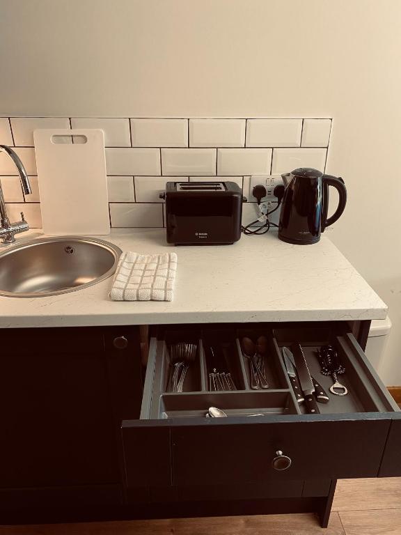 Ben Nevis Inn Roomsにあるキッチンまたは簡易キッチン