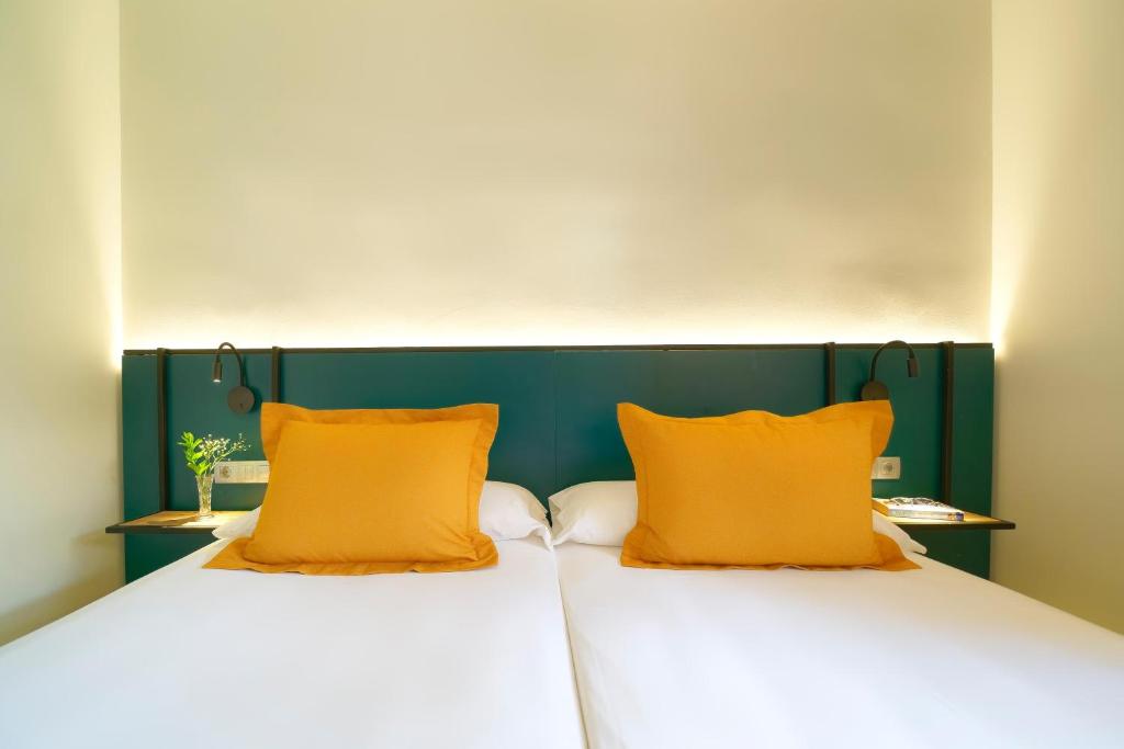 Letto o letti in una camera di Suites & Villas by Dunas
