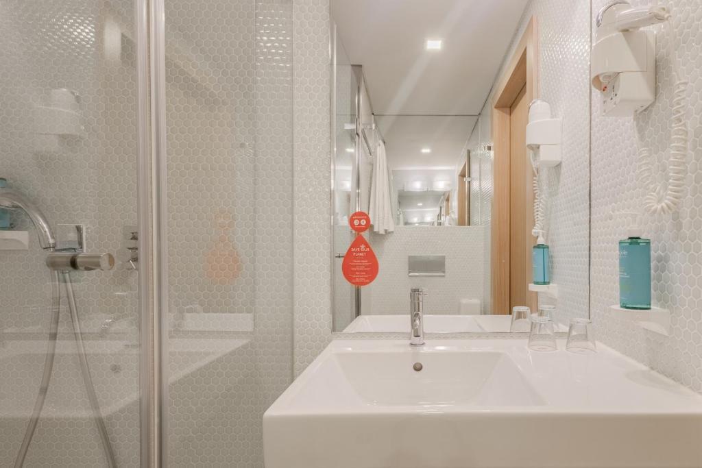 Koupelna v ubytování Moov Hotel Porto Norte