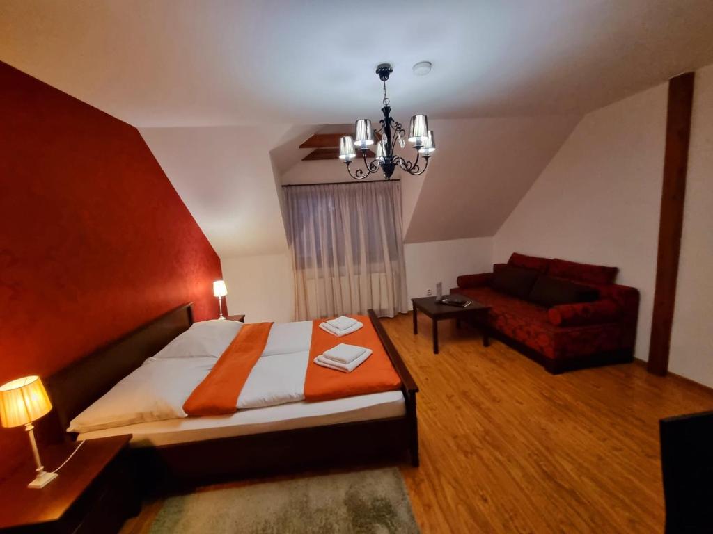 Postel nebo postele na pokoji v ubytování B&B Penzión Magura