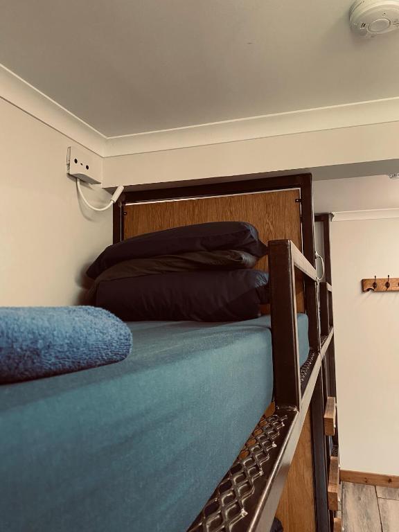 Ben Nevis Inn Roomsにあるベッド