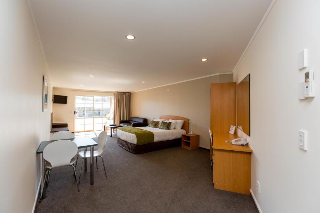Postel nebo postele na pokoji v ubytování Aspen Court Motel Taihape