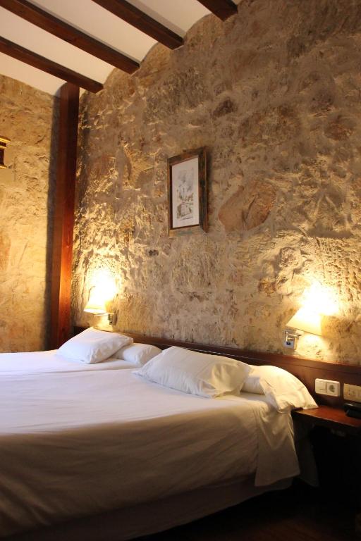 Postel nebo postele na pokoji v ubytování Hotel Microtel Placentinos