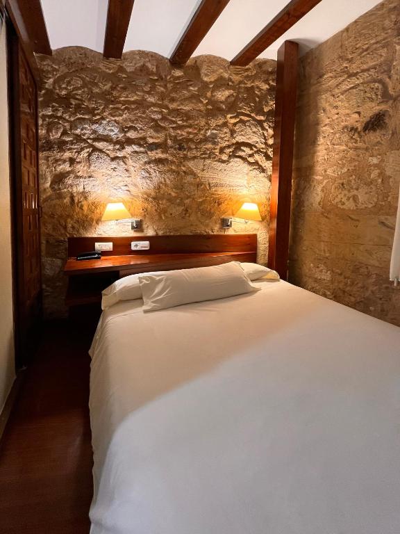Postel nebo postele na pokoji v ubytování Hotel Microtel Placentinos