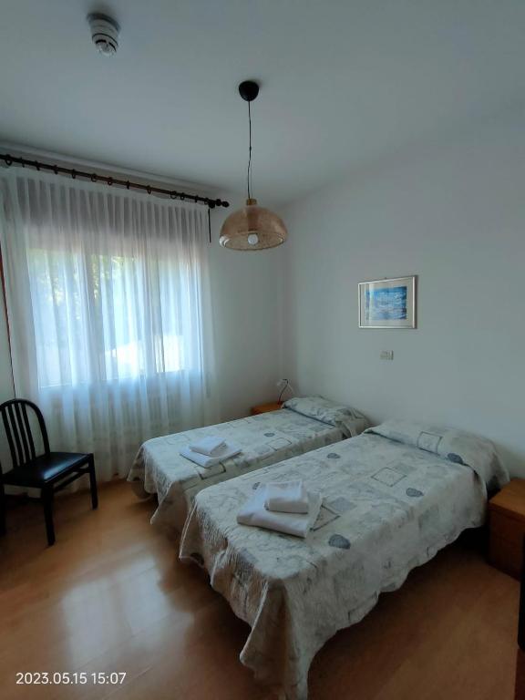 Postel nebo postele na pokoji v ubytování Albergo Dalla Mena